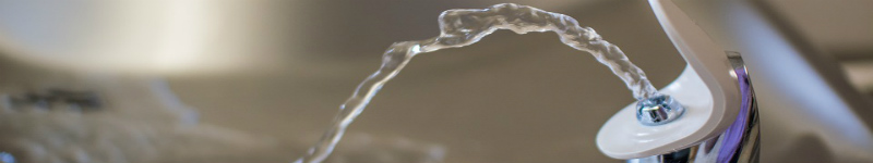 drinking water spigot with water arc